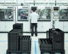 A production worker in the electronics factory in Hamm